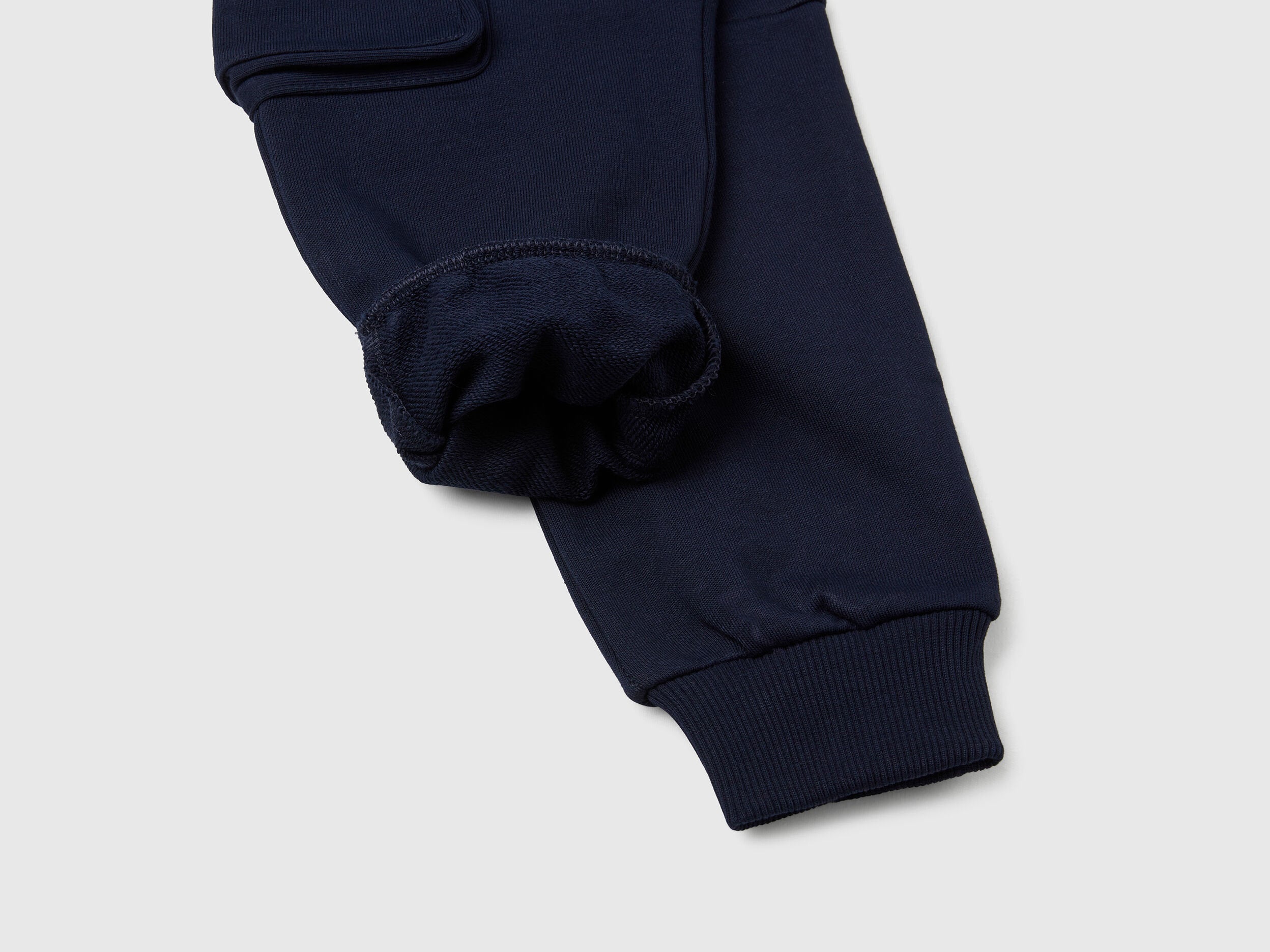 Benetton boys dark blue cargo sweatpants logo embroidery close-up