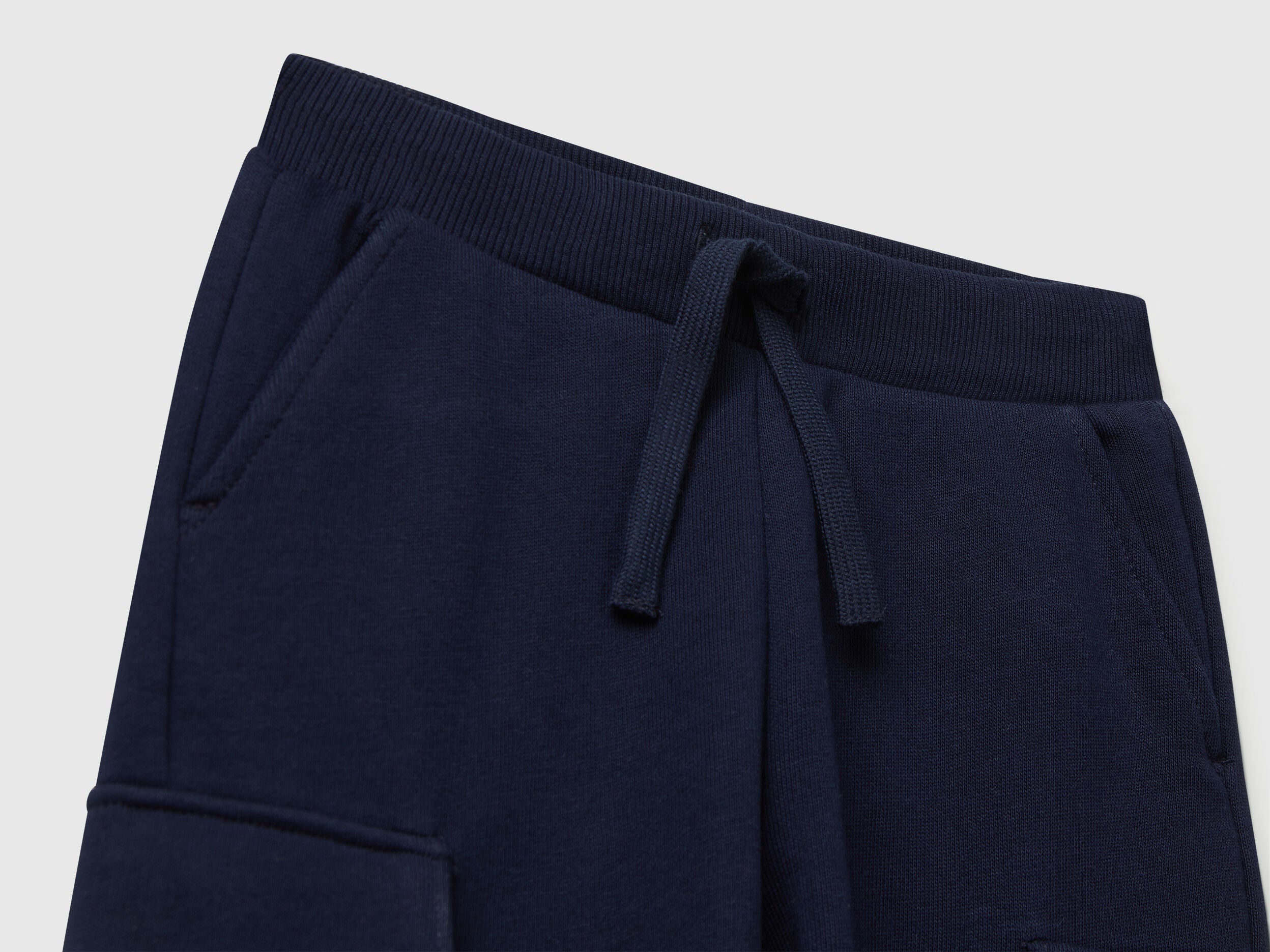 Back view of Benetton cargo joggers with drawstring waist