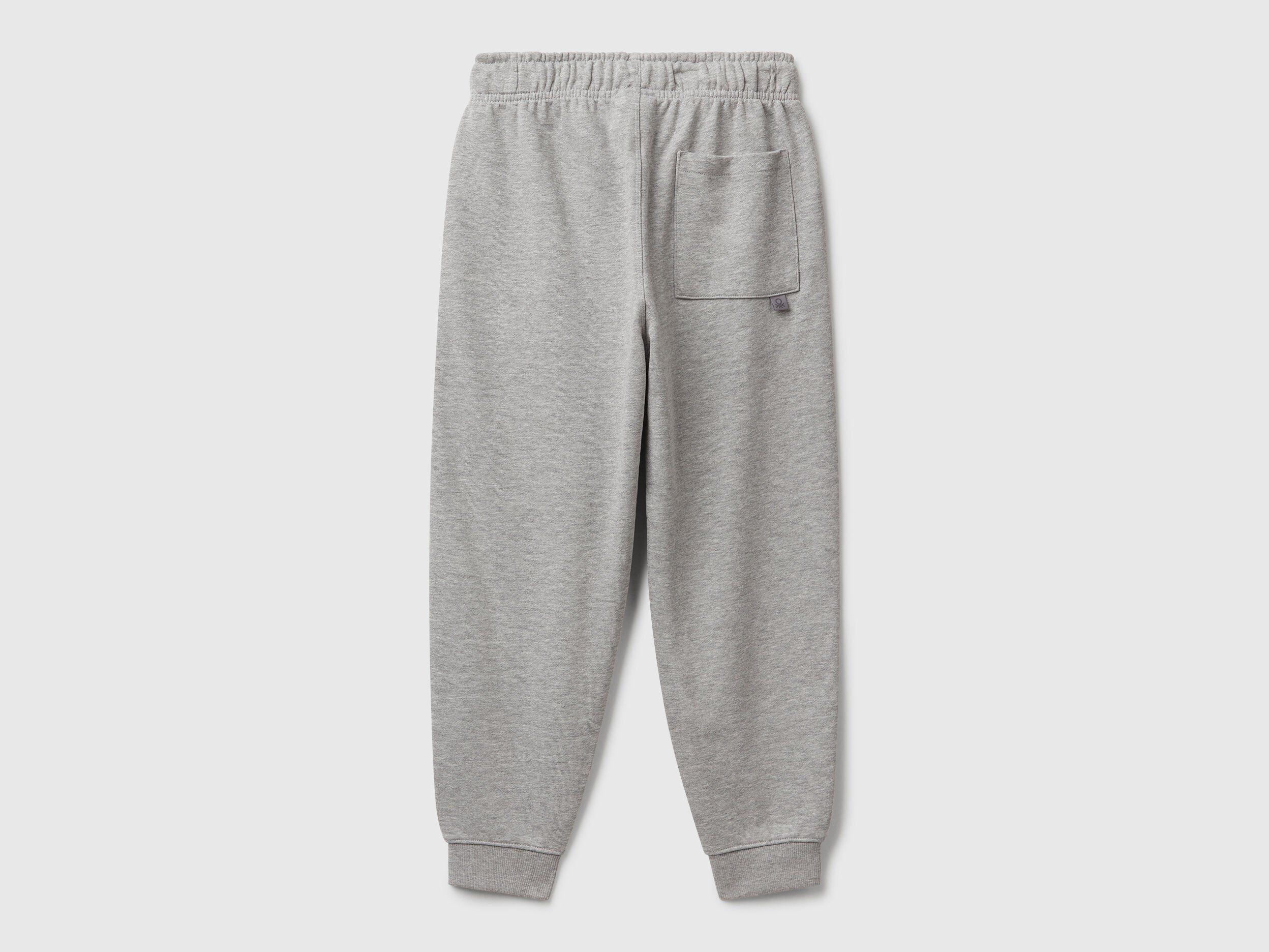Benetton pure cotton joggers side detail view showing patch pocket