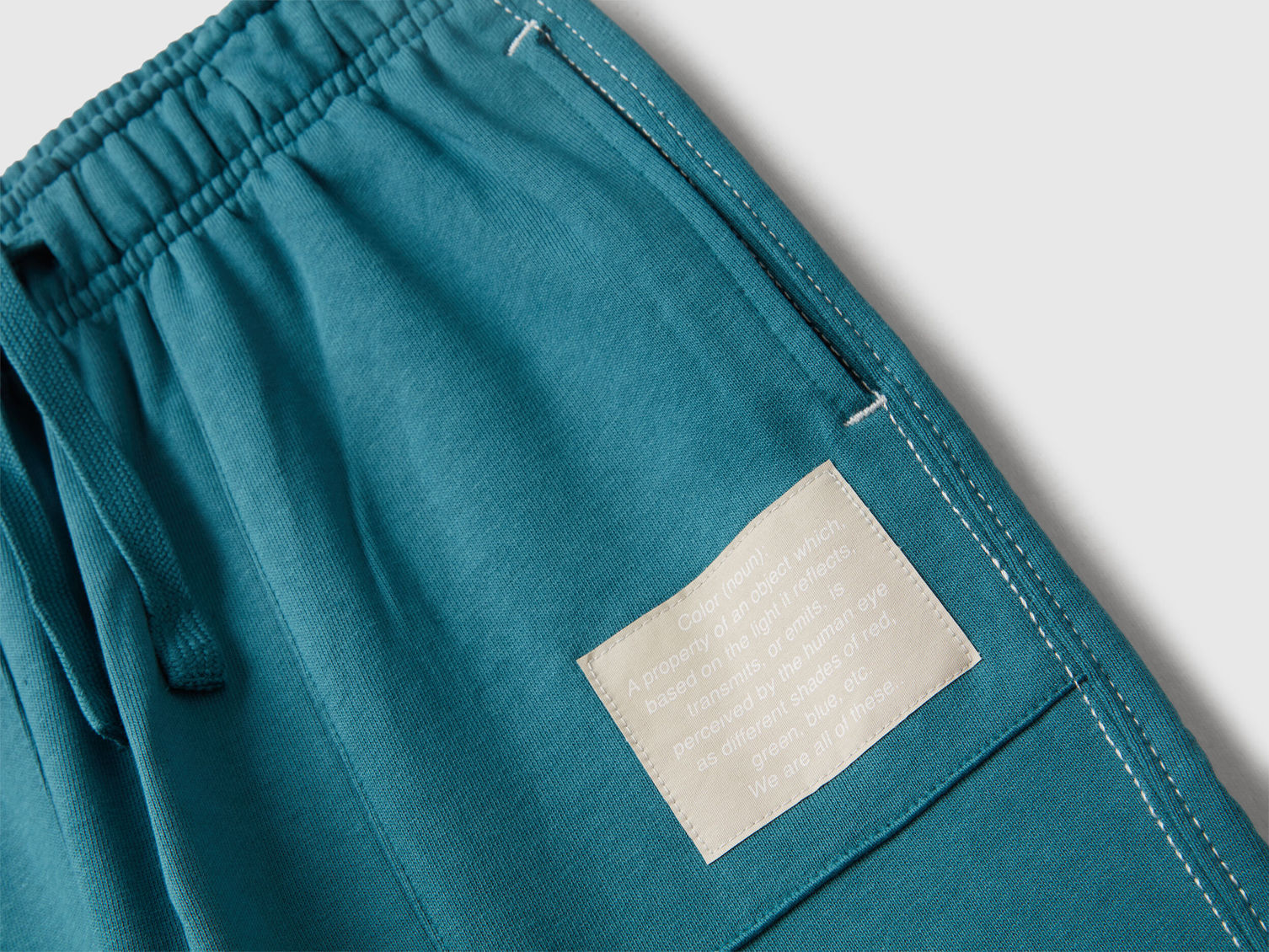 Close-up of Benetton pure cotton joggers fabric detail