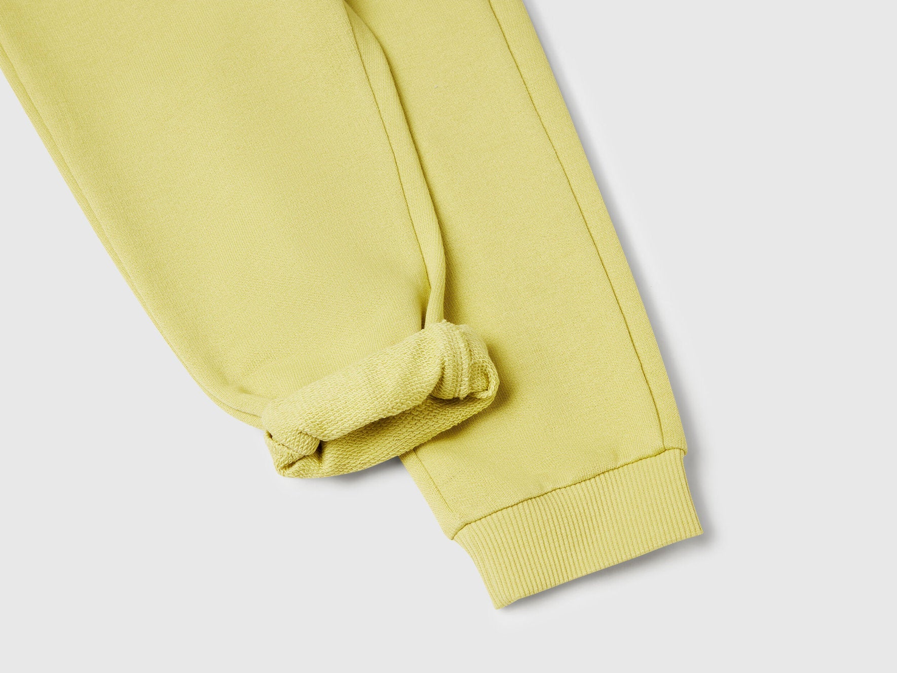 enetton yellow organic cotton trousers side view showing regular fit