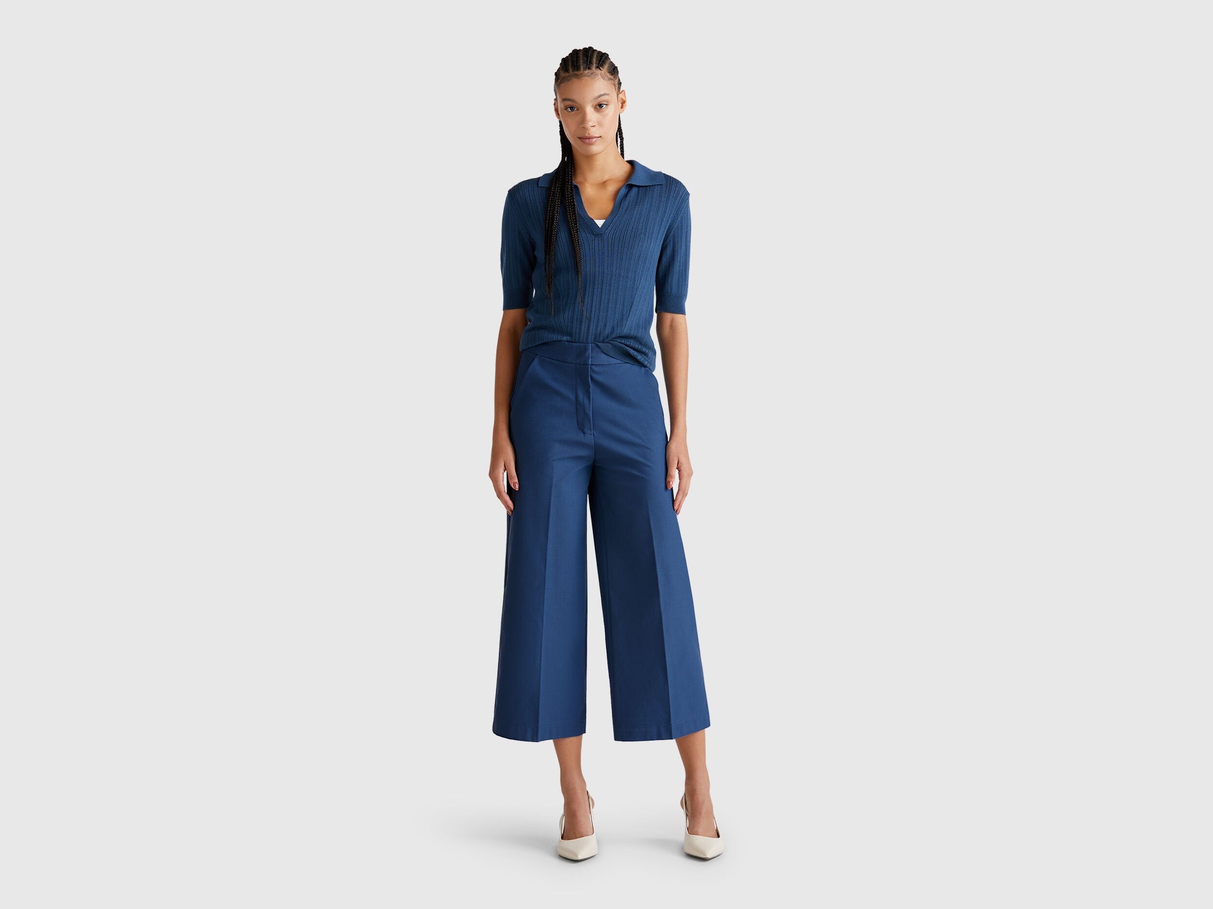 A female model wearing blue women&