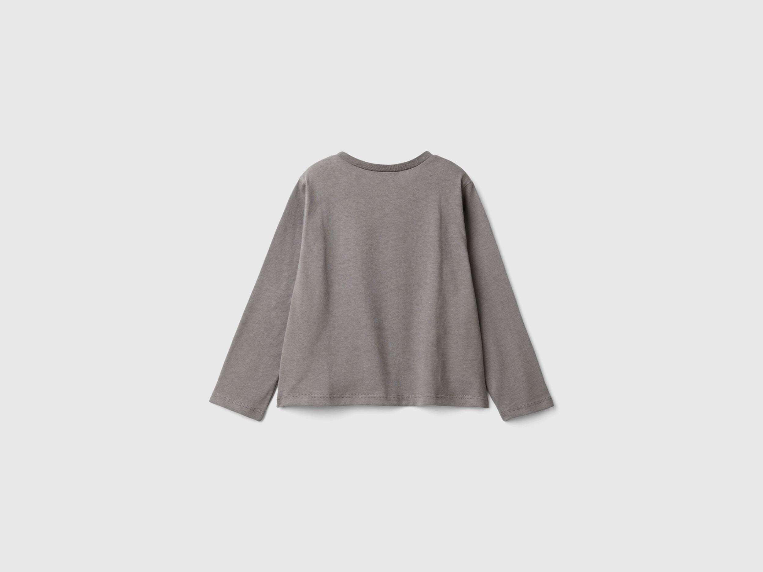Back view of a plain grey long-sleeve t-shirt, part of the Barbie collection. Soft fabric.