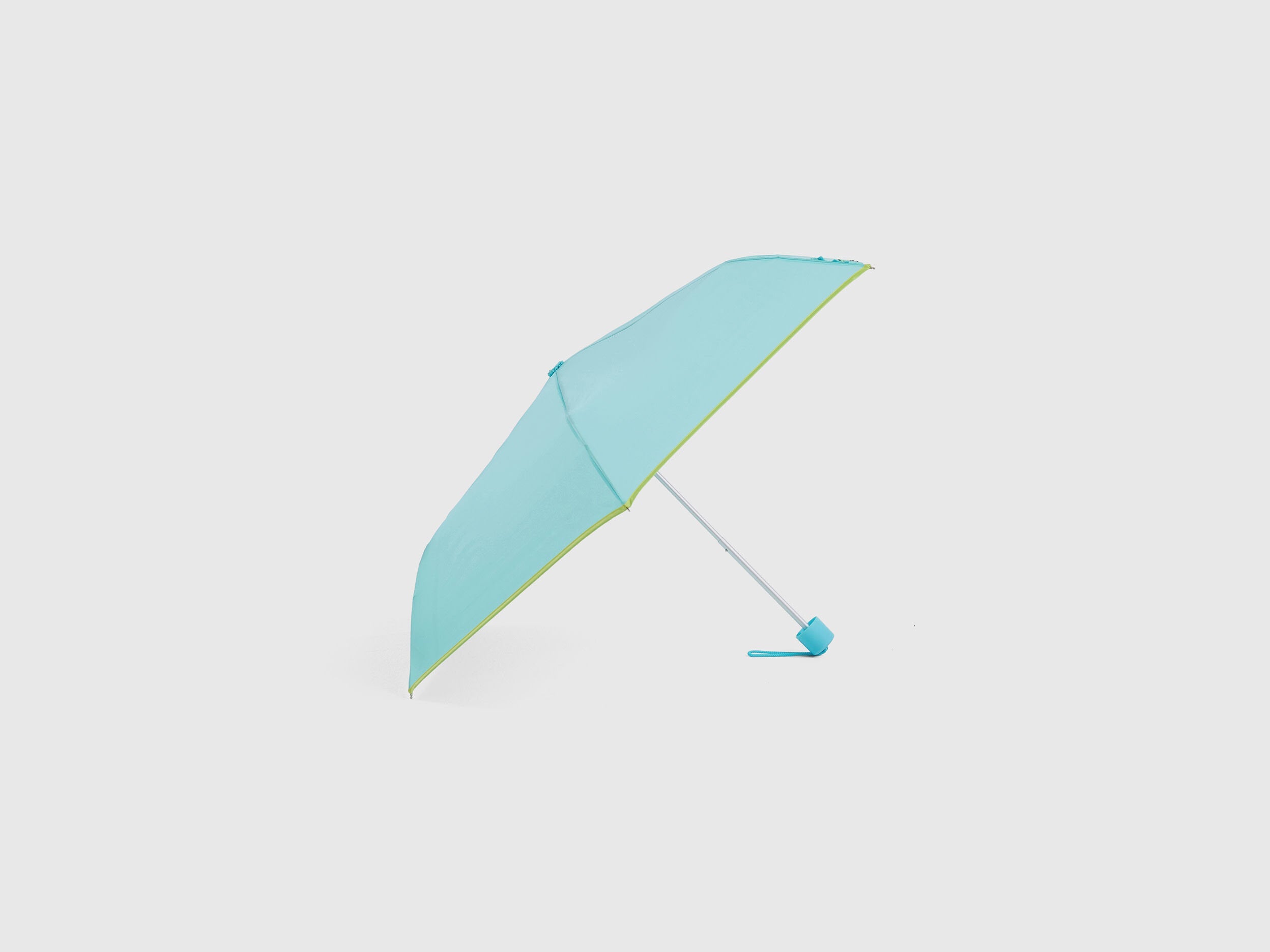 Light blue Benetton umbrella, partially open, sleek design.