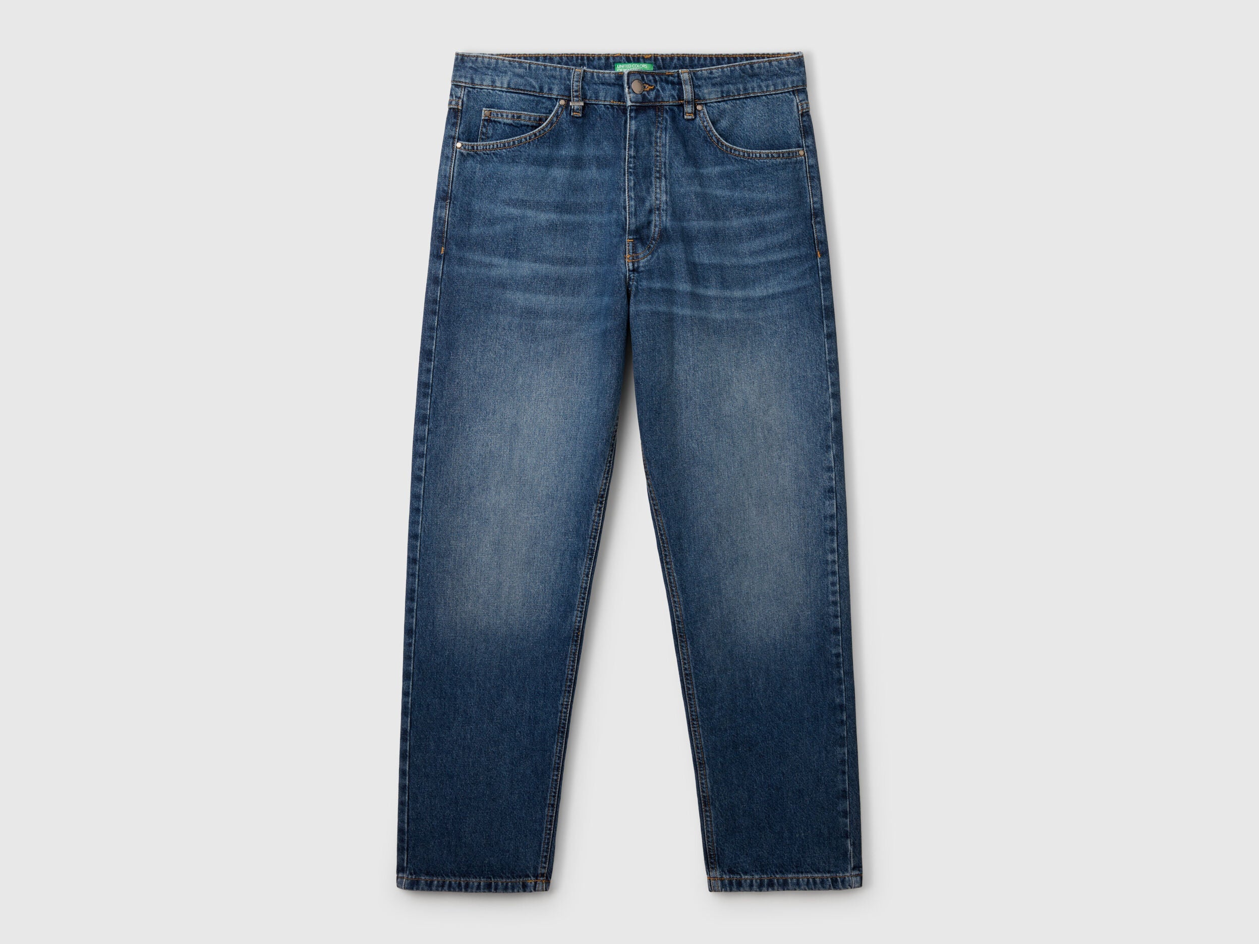 Close-up of the waistband and button fly on a pair of men&
