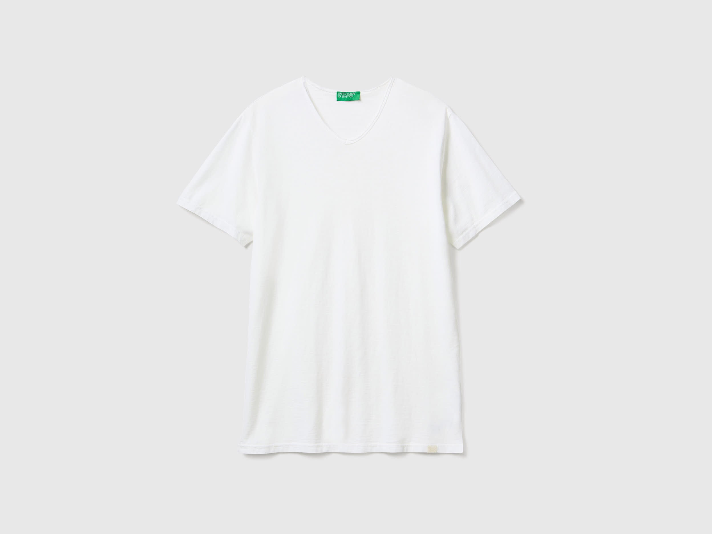 Flat lay front view of a white V-neck t-shirt for men, 100% cotton.