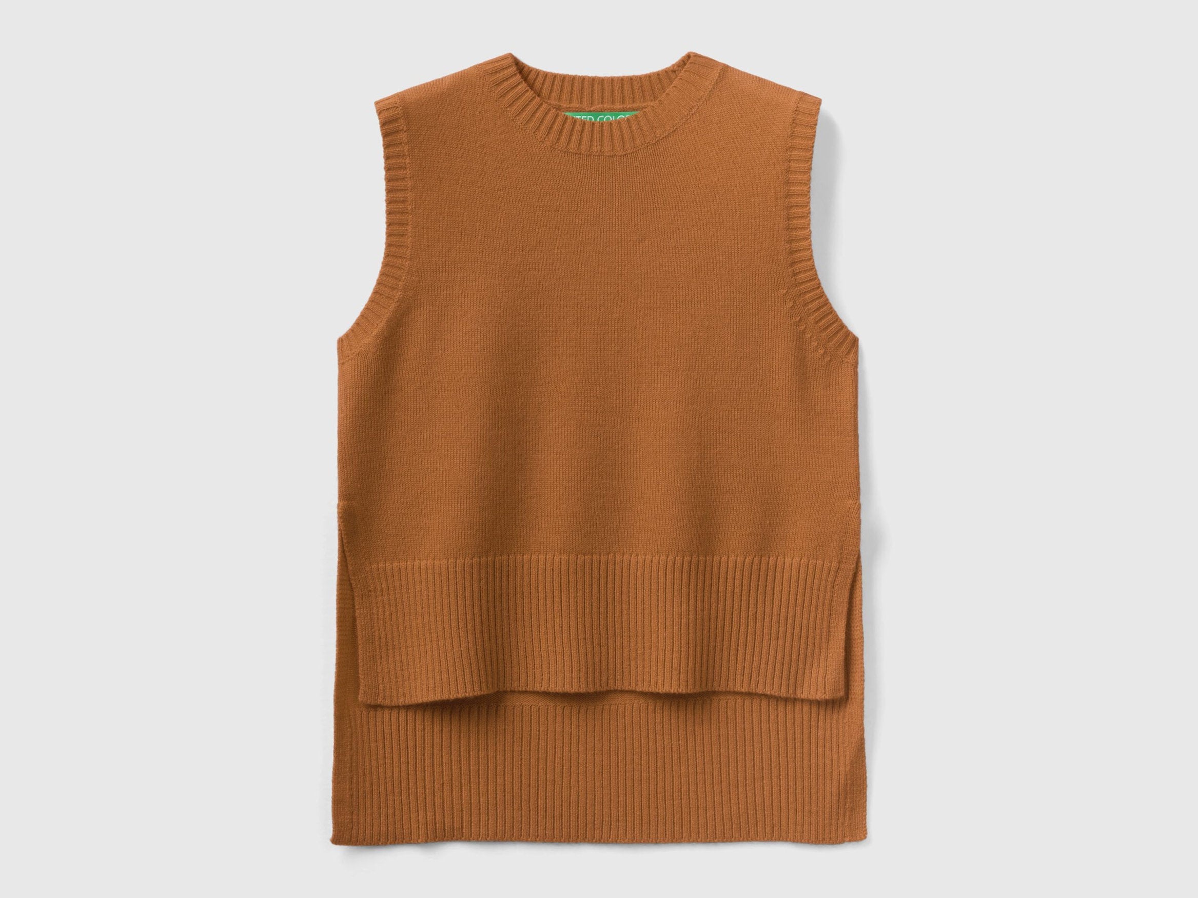Front flat lay of a light brown knit vest with a ribbed hem.