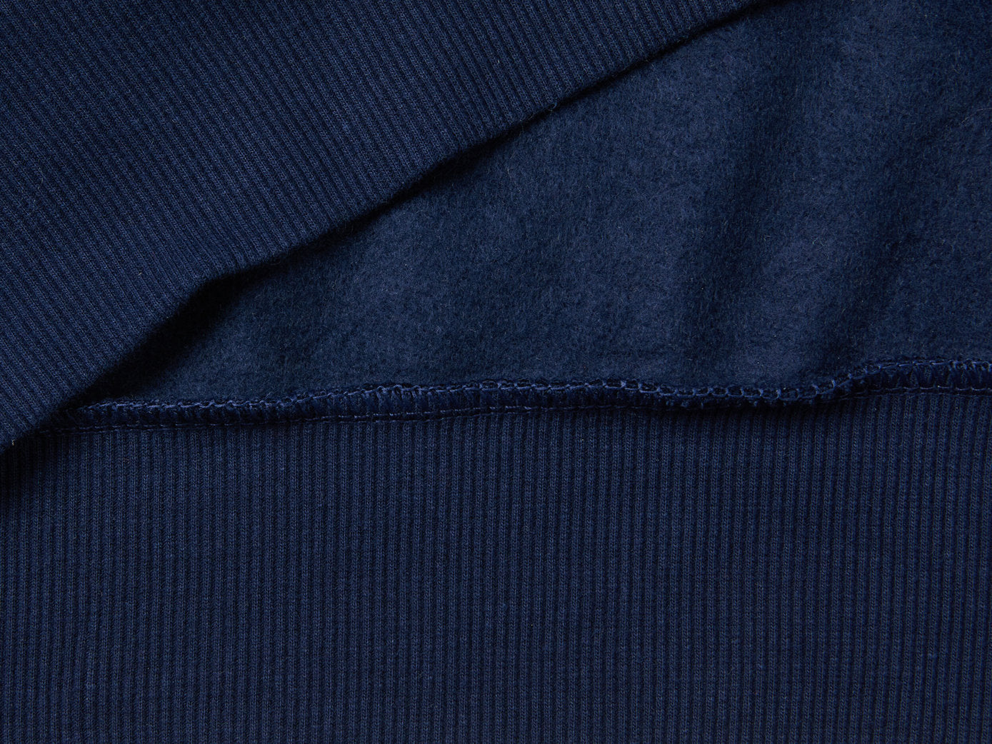 Flat lay back view of a blue pullover hoodie for men.