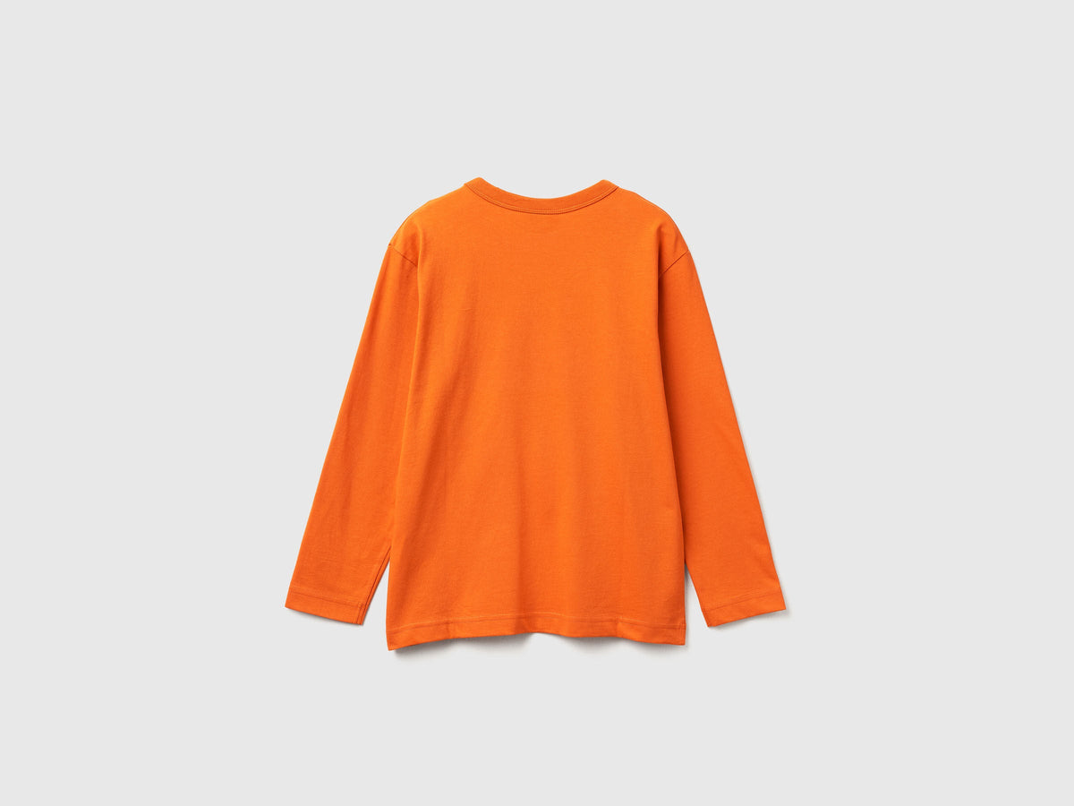 Benetton_Orange_T-Shirt Featuring Garfield ©2025 By Paws, Inc._35RYC10QA_04J_02