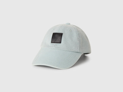 Front view of branded baseball cap, displayed as a standalone item.
