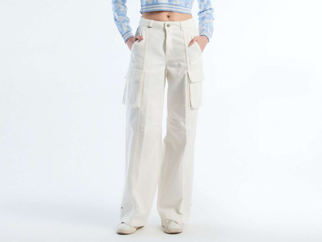 Front view of beige wide-leg cargo pants, popular for a casual style in Kuwait.