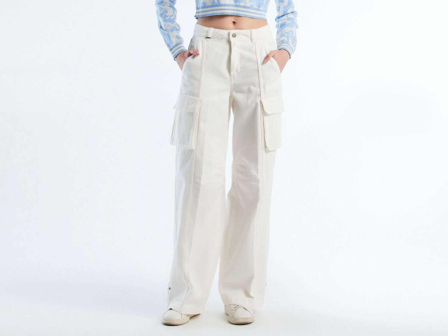 Front view of beige wide-leg cargo pants, popular for a casual style in Kuwait.