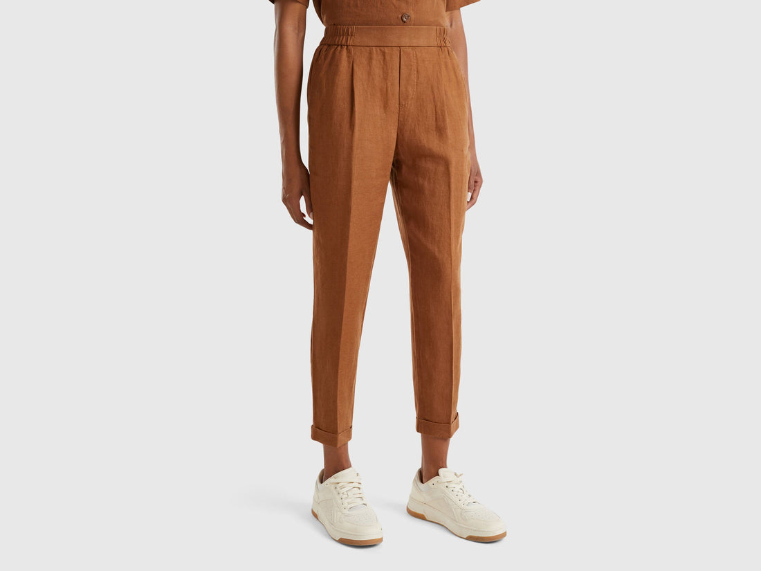A female model wearing beige women&