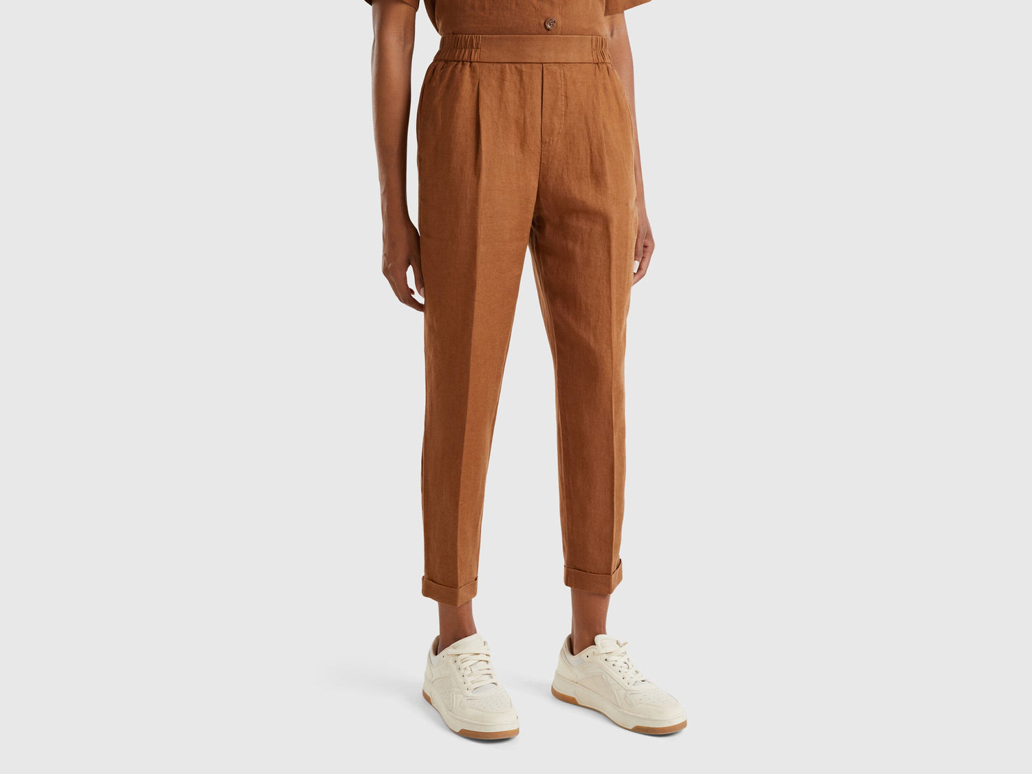 A female model wearing beige women&