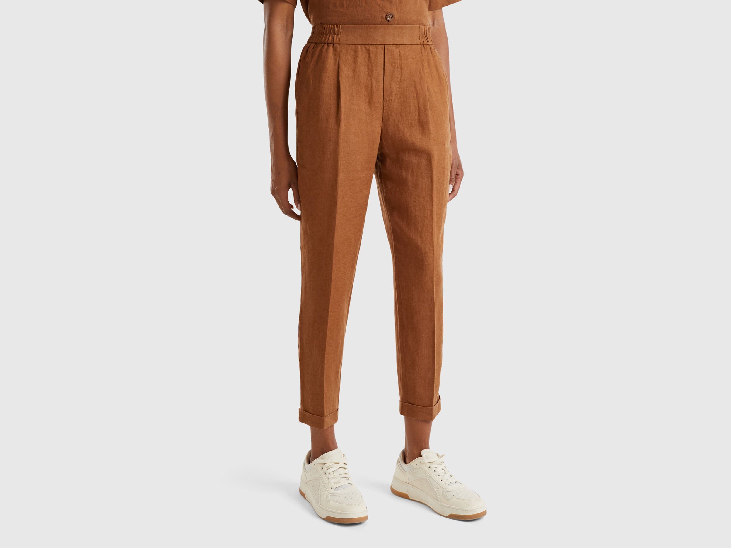 A female model wearing beige women&