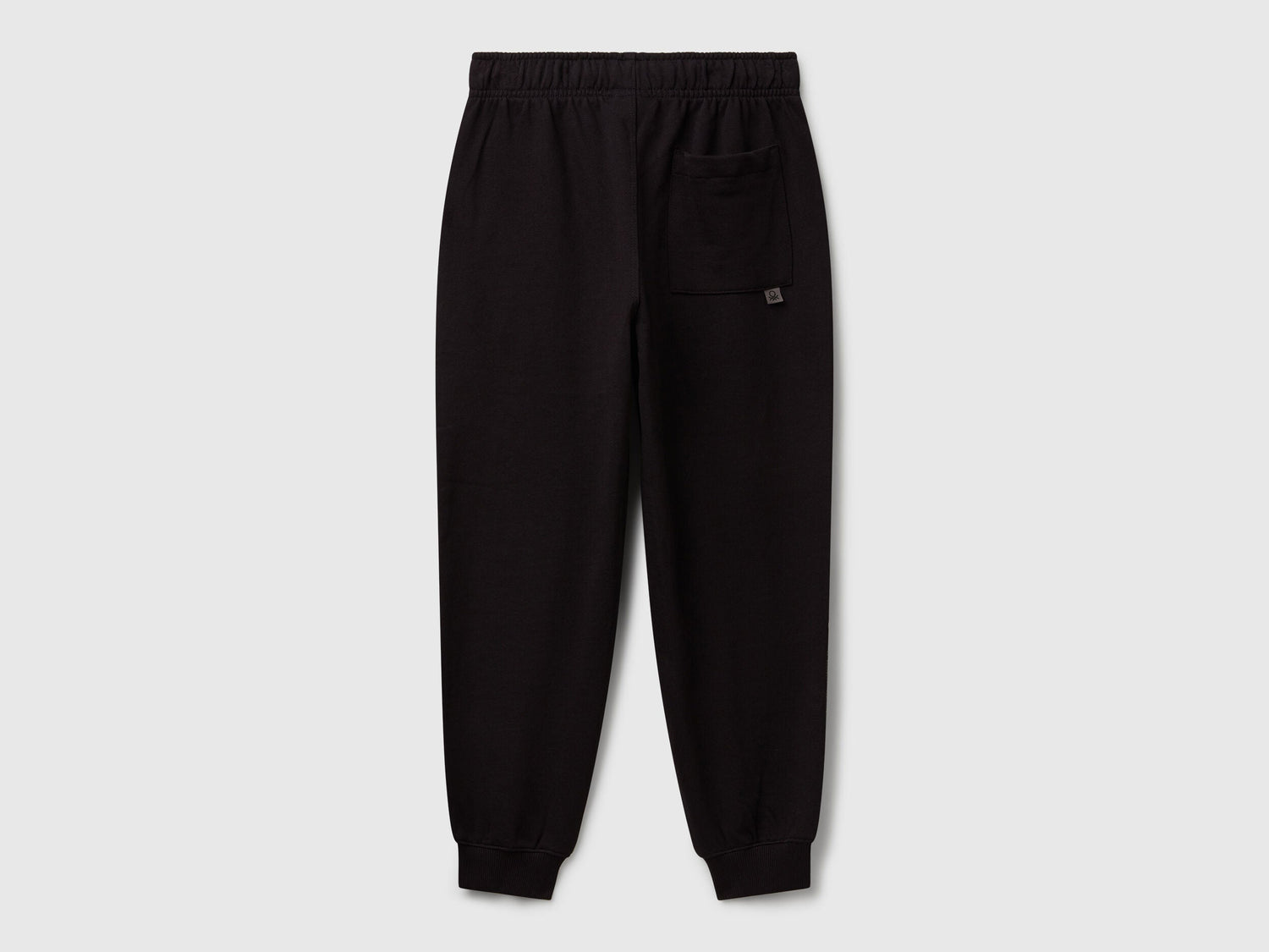 Benetton black cotton joggers side view showing patch pocket detail