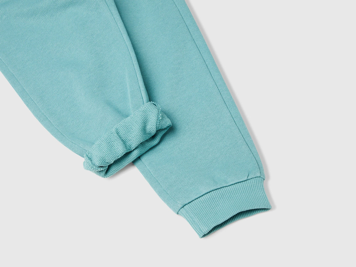 Benetton blue organic cotton trousers side view showing regular fit