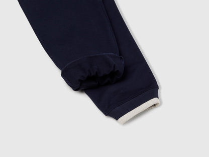 Benetton blue cotton sweatpants side view showing comfortable fit