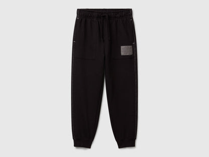 Benetton boys black pure cotton joggers front view relaxed fit