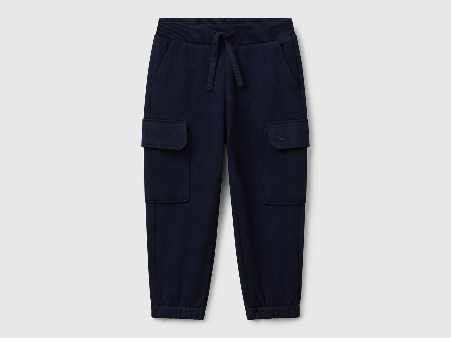 Benetton boys blue cargo joggers front view with flap pockets
