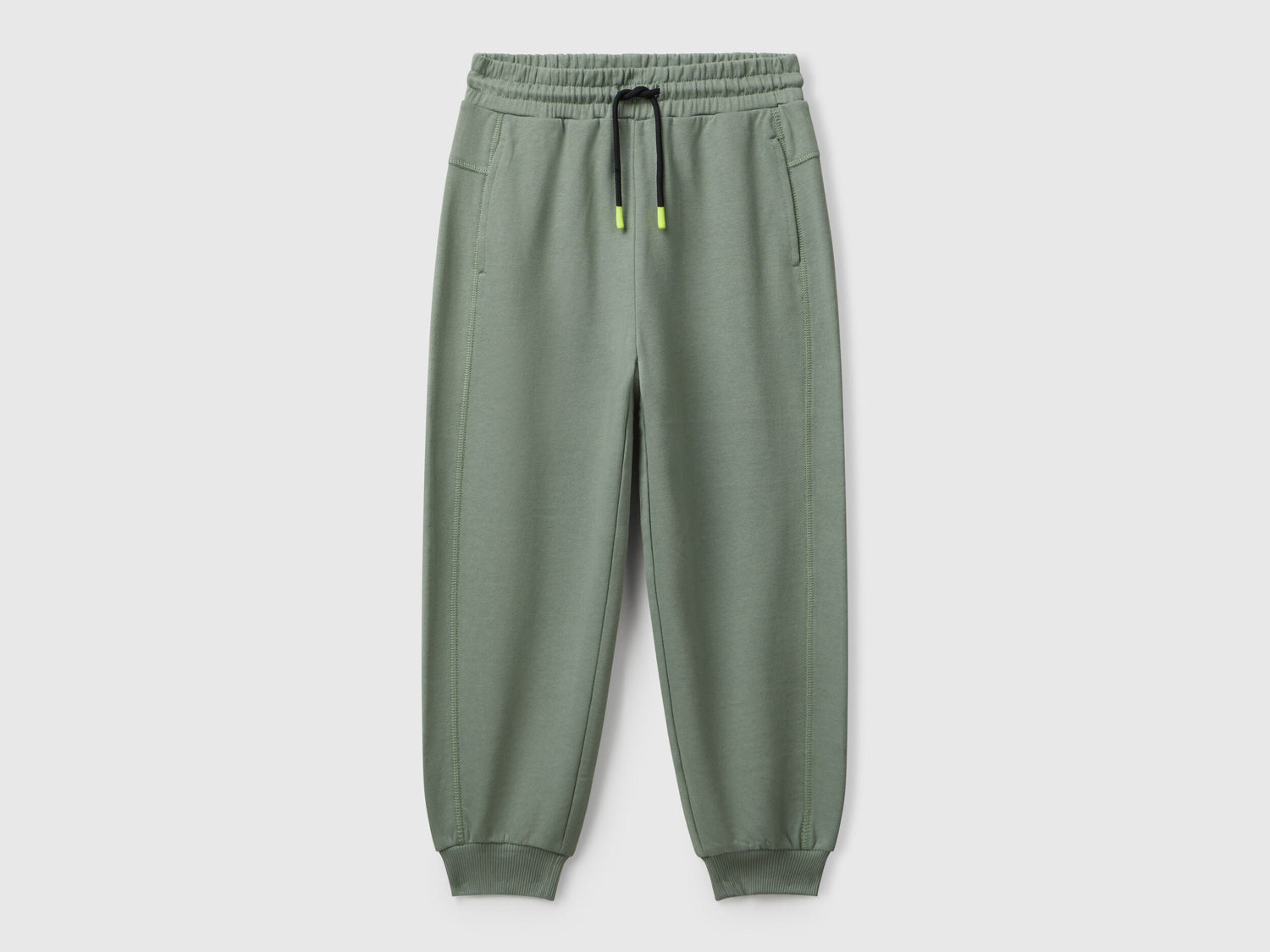 Benetton boys green graffiti print sweatpants front view with street style design