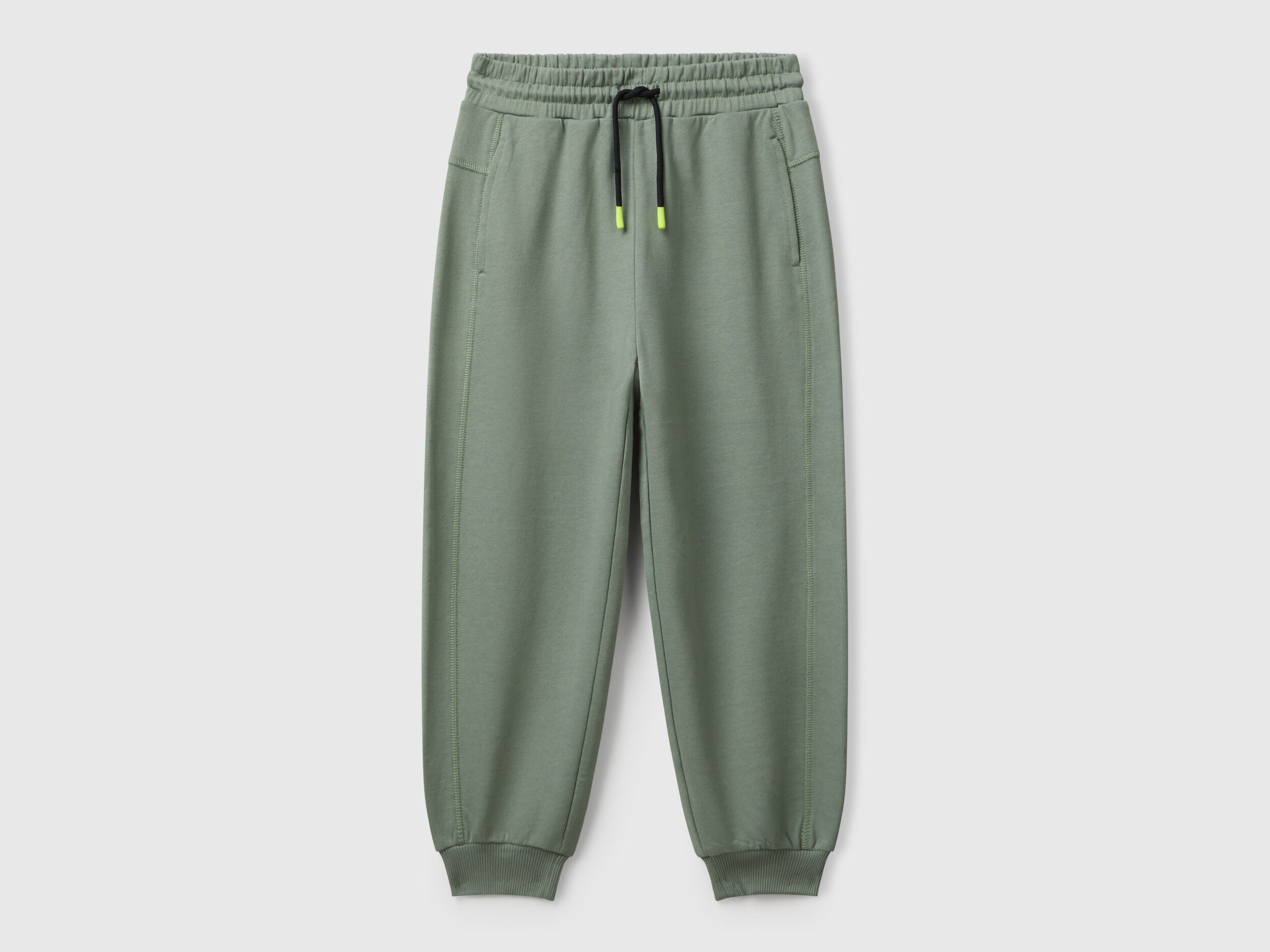 Benetton boys green graffiti print sweatpants front view with street style design