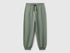 Benetton boys green graffiti print sweatpants front view with street style design