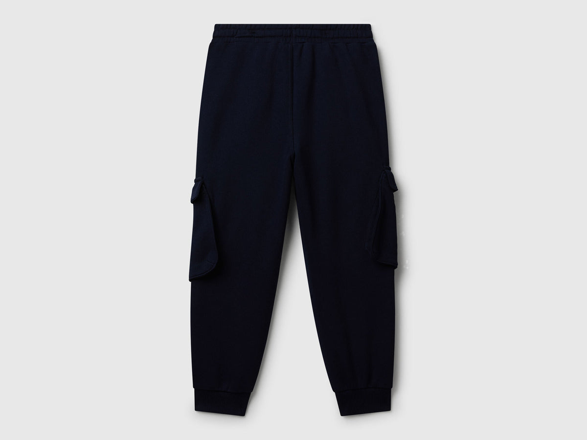 Side view of Benetton boys cargo joggers in dark blue