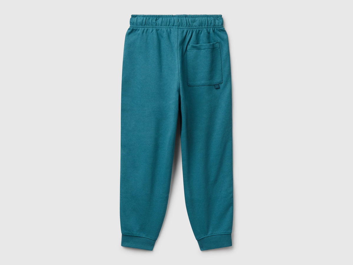 Side view of Benetton boys cotton joggers in blue
