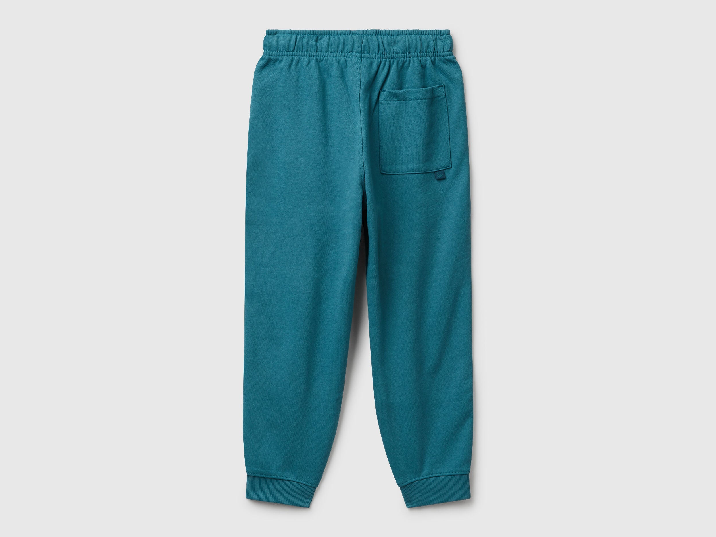 Side view of Benetton boys cotton joggers in blue