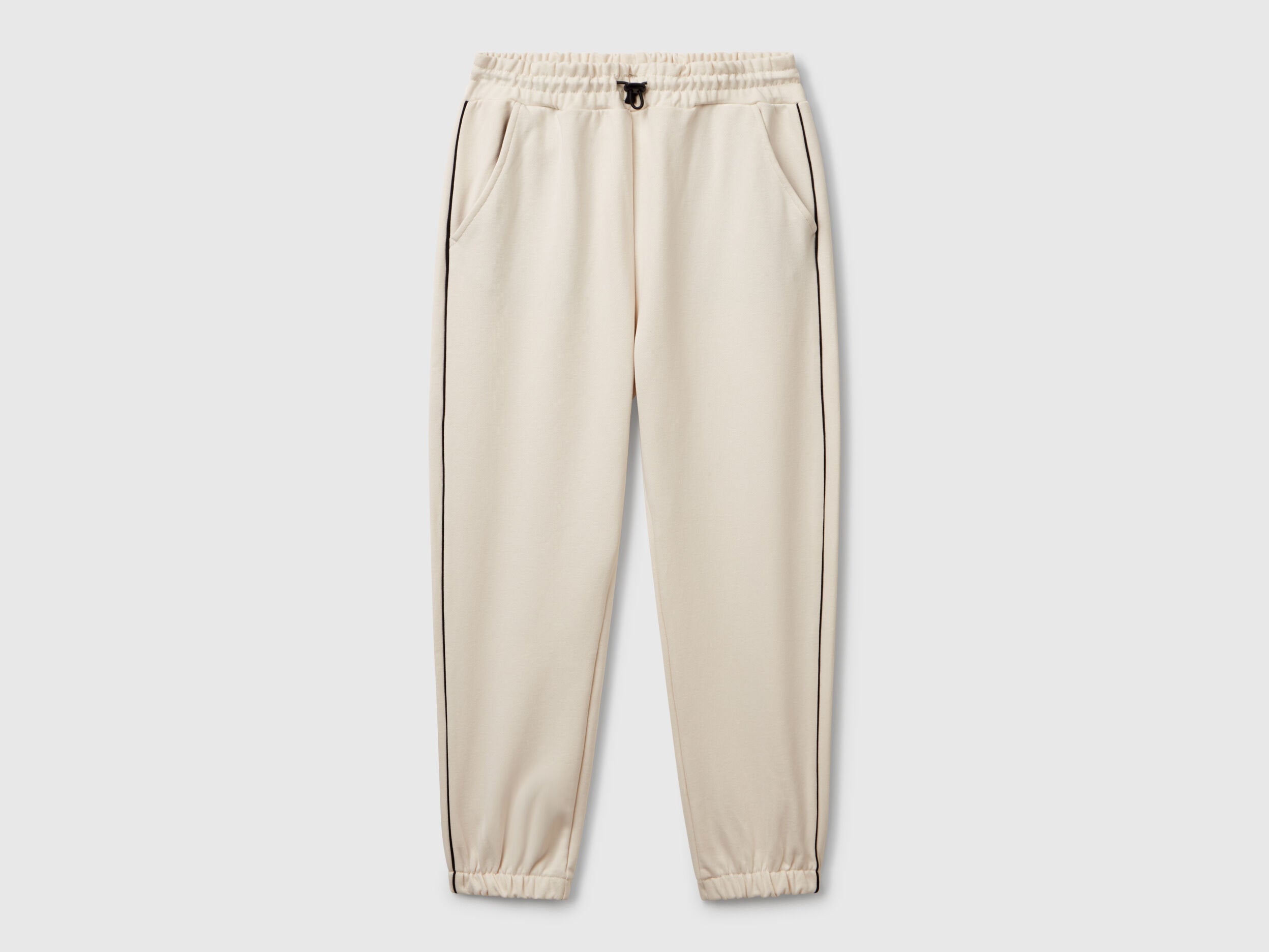 Benetton boys olive green sweatpants front view with piping detail