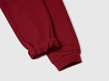 Benetton brown organic cotton trousers side view showing regular fit
