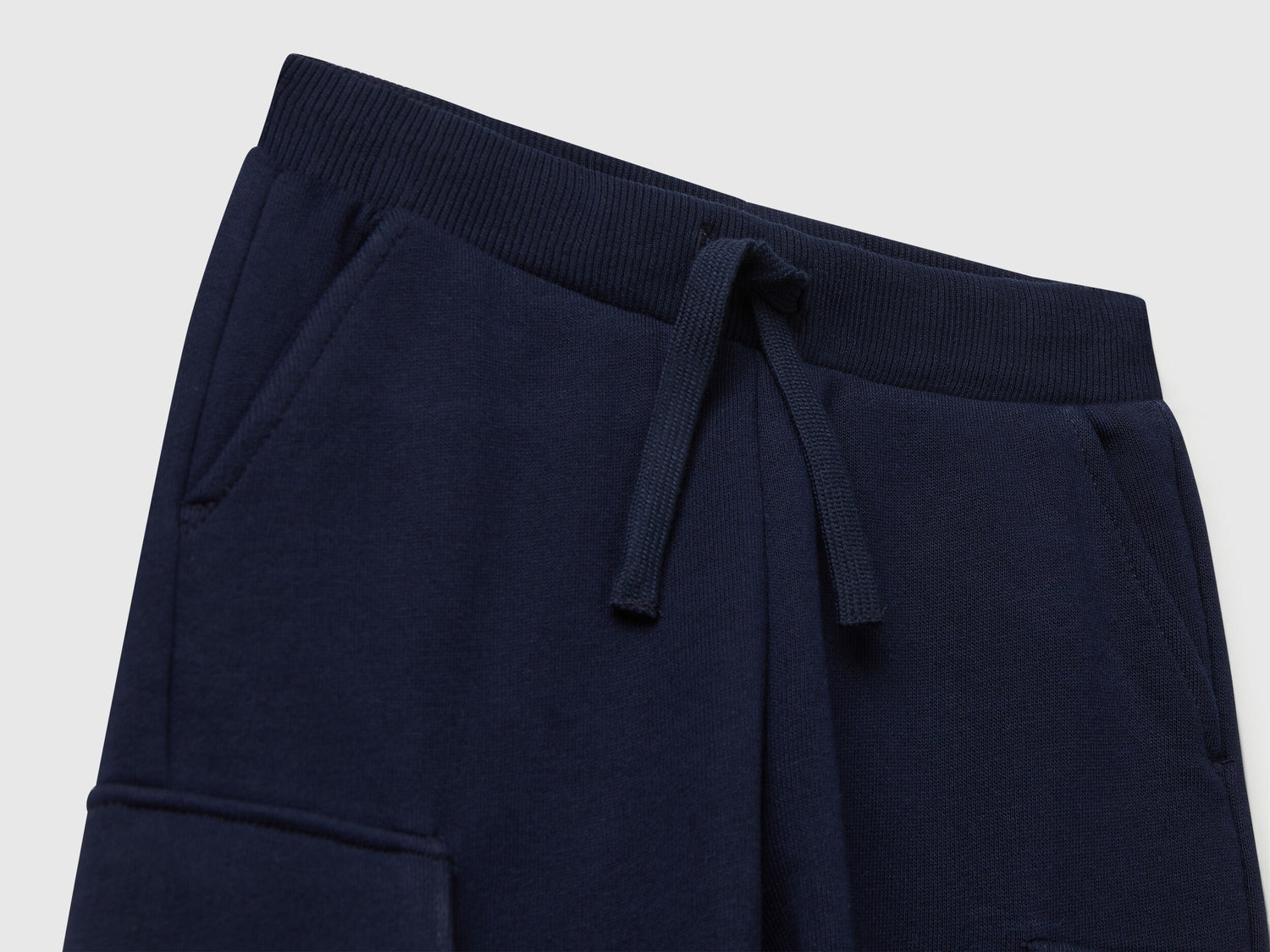 Back view of Benetton cargo joggers with drawstring waist