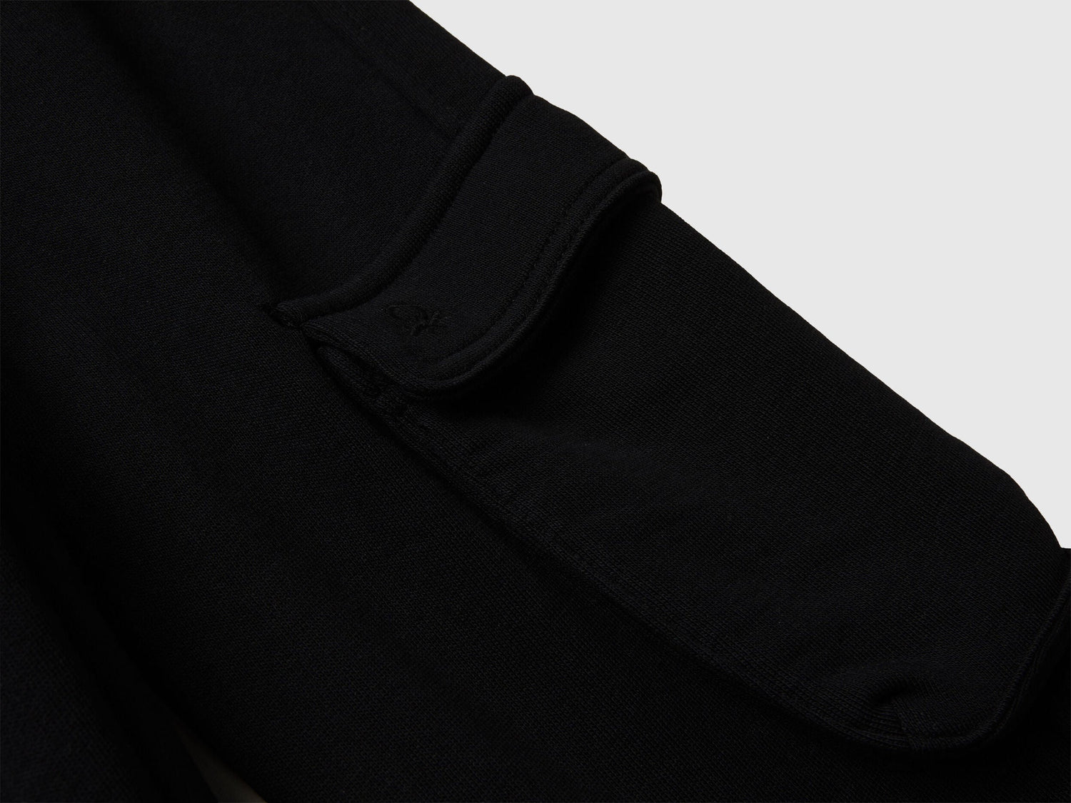 Back view of Benetton cargo joggers with drawstring waist