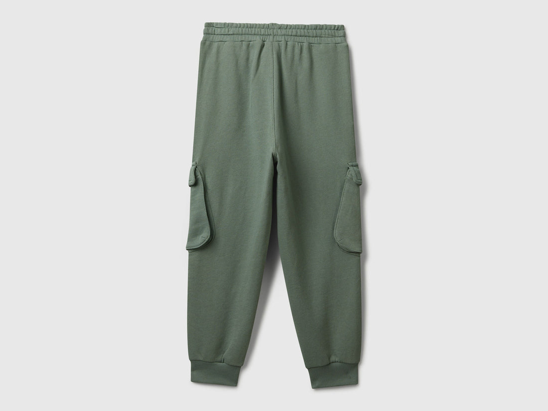 Side view of Benetton cotton cargo joggers with drawstring waist