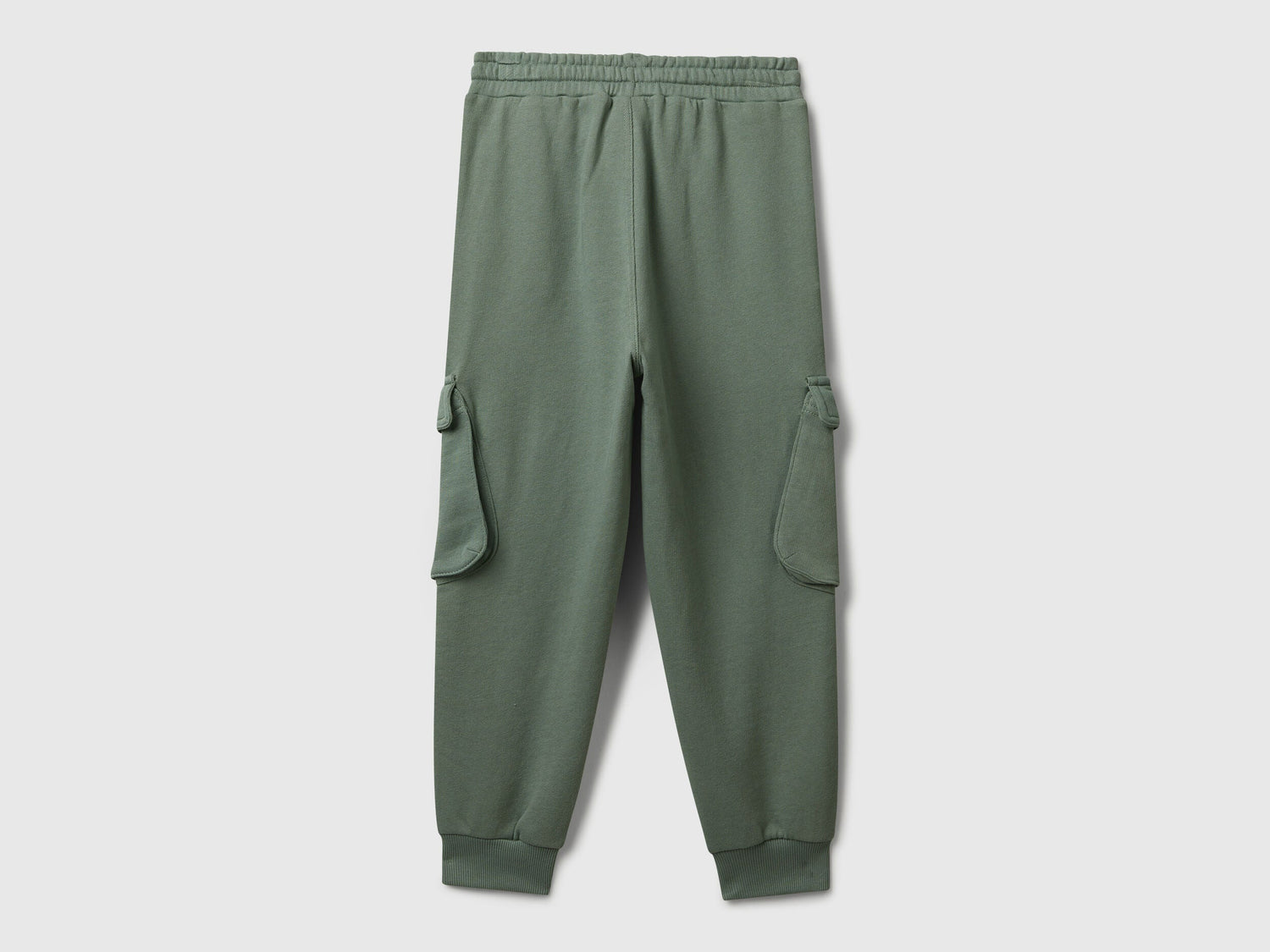 Side view of Benetton cotton cargo joggers with drawstring waist