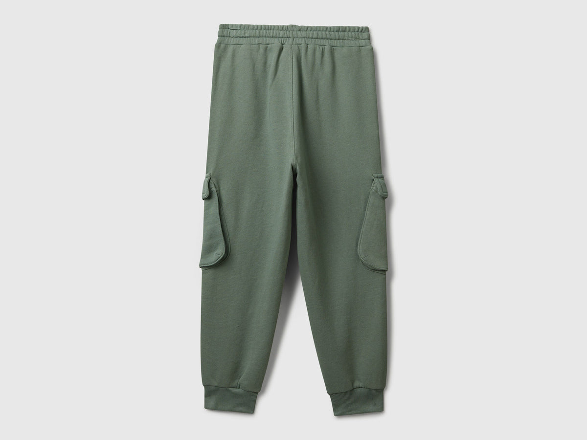 Side view of Benetton cotton cargo joggers with drawstring waist
