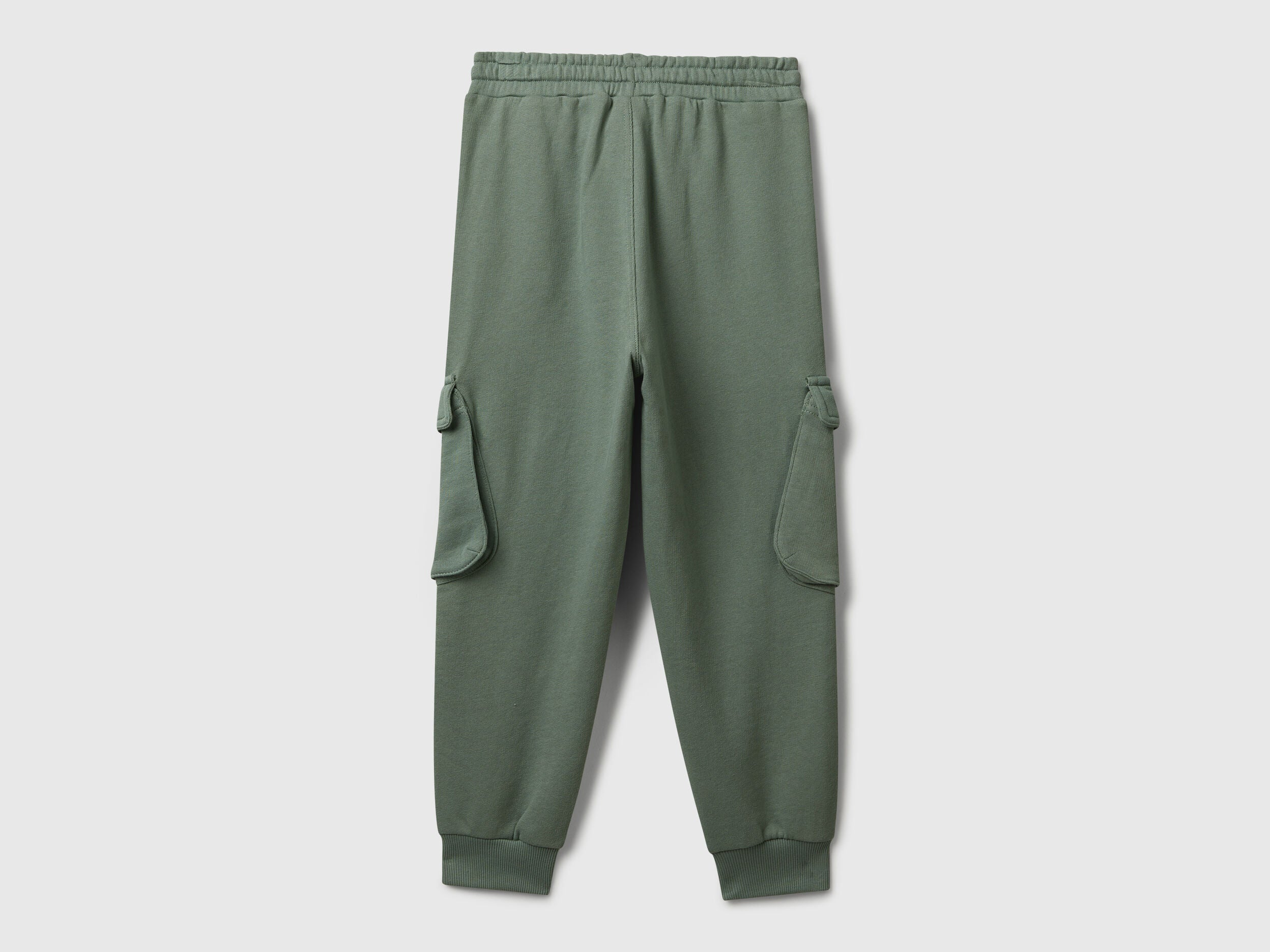 Side view of Benetton cotton cargo joggers with drawstring waist