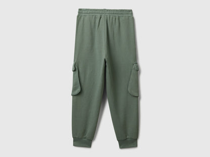 Side view of Benetton cotton cargo joggers with drawstring waist