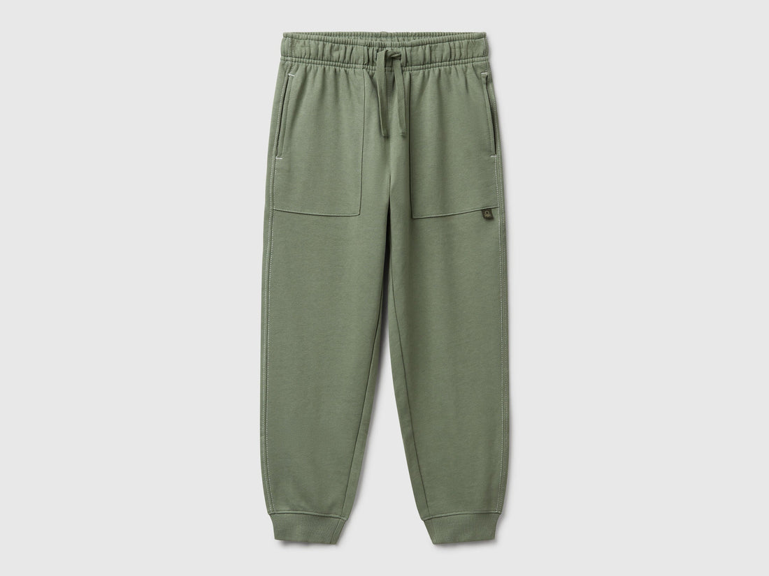 Benetton green pure cotton joggers front view with pockets