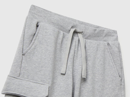 Back view of Benetton grey cargo joggers with drawstring waist