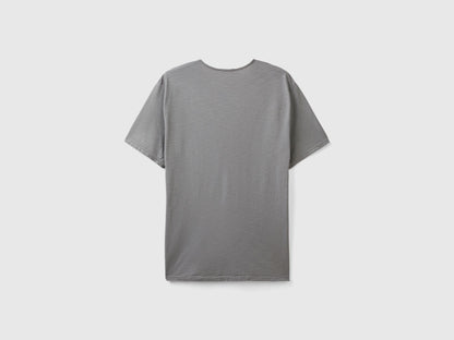 Grey Benetton V-neck T-shirt for men, made of 100% cotton, shown as a standalone product from the back.