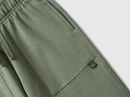 Close-up of Benetton joggers elastic waist and logo detail