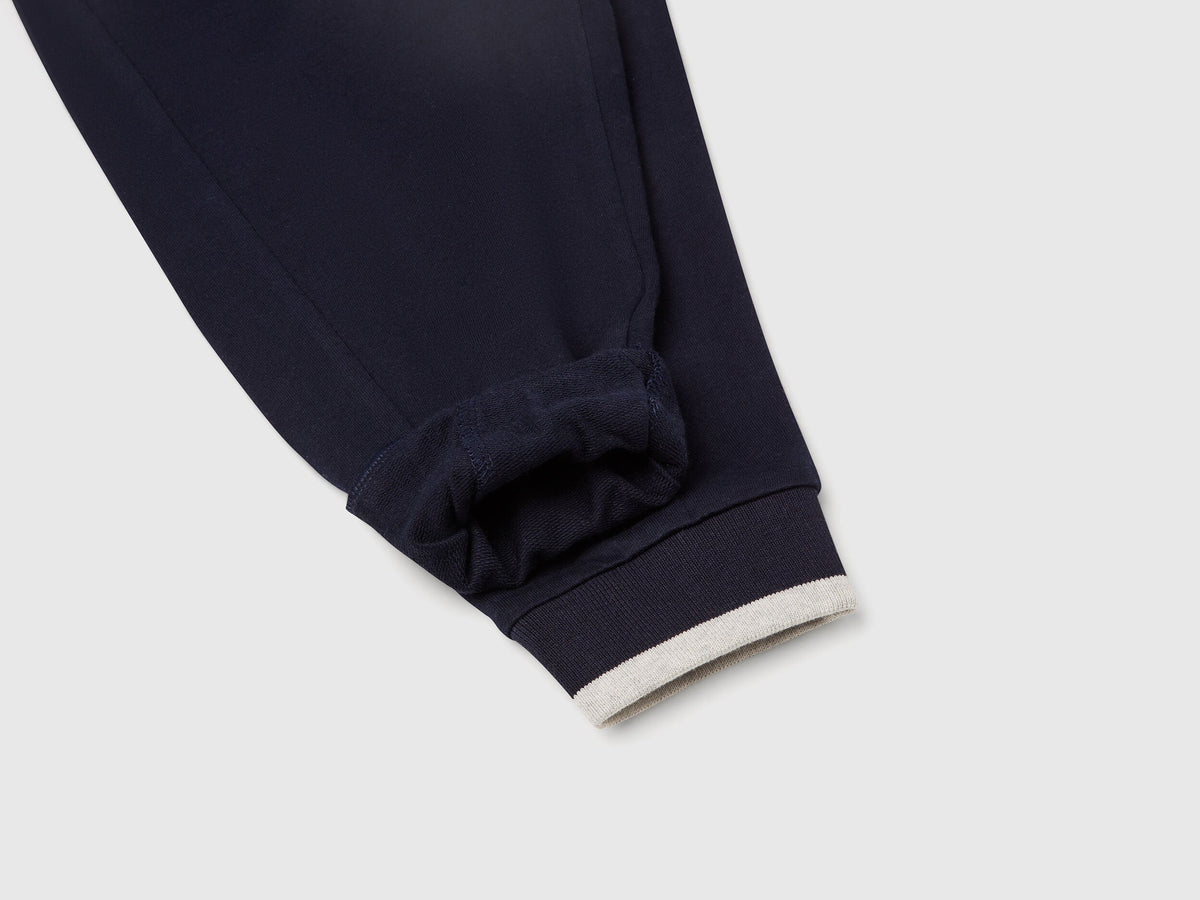 Back view of Benetton lightweight joggers with comfortable fit and branding