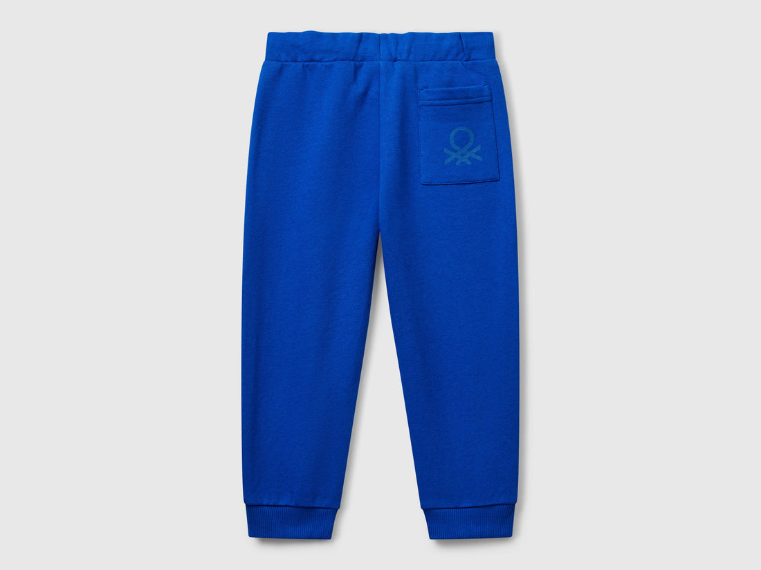 Back view of Benetton logo print sweatpants with certified organic detail