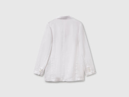 Back view of a classic white Benetton blazer made from pure linen, showcasing its light and breathable fabric.