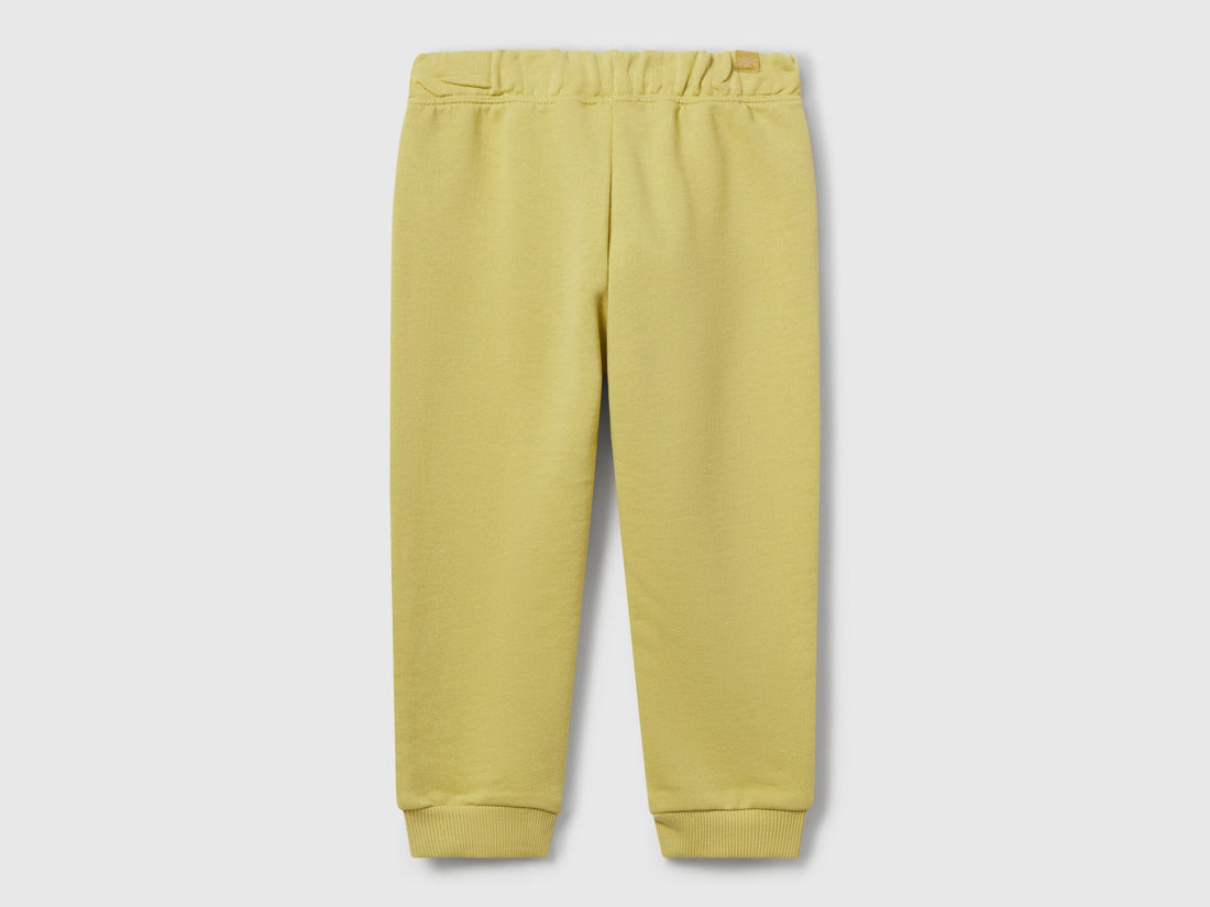 Back view of Benetton sweat joggers with logo tag and relaxed fit