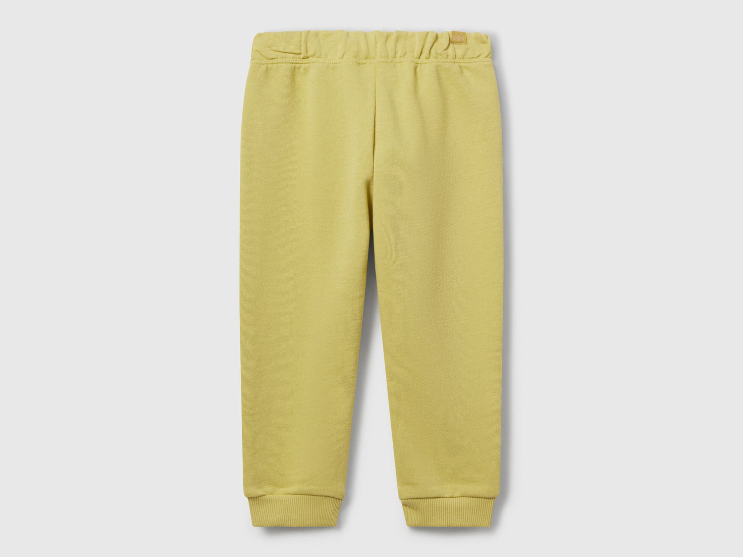 Back view of Benetton sweat joggers with logo tag and relaxed fit