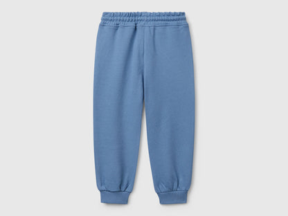 Back view of Benetton sweatpants with elastic bottom detail