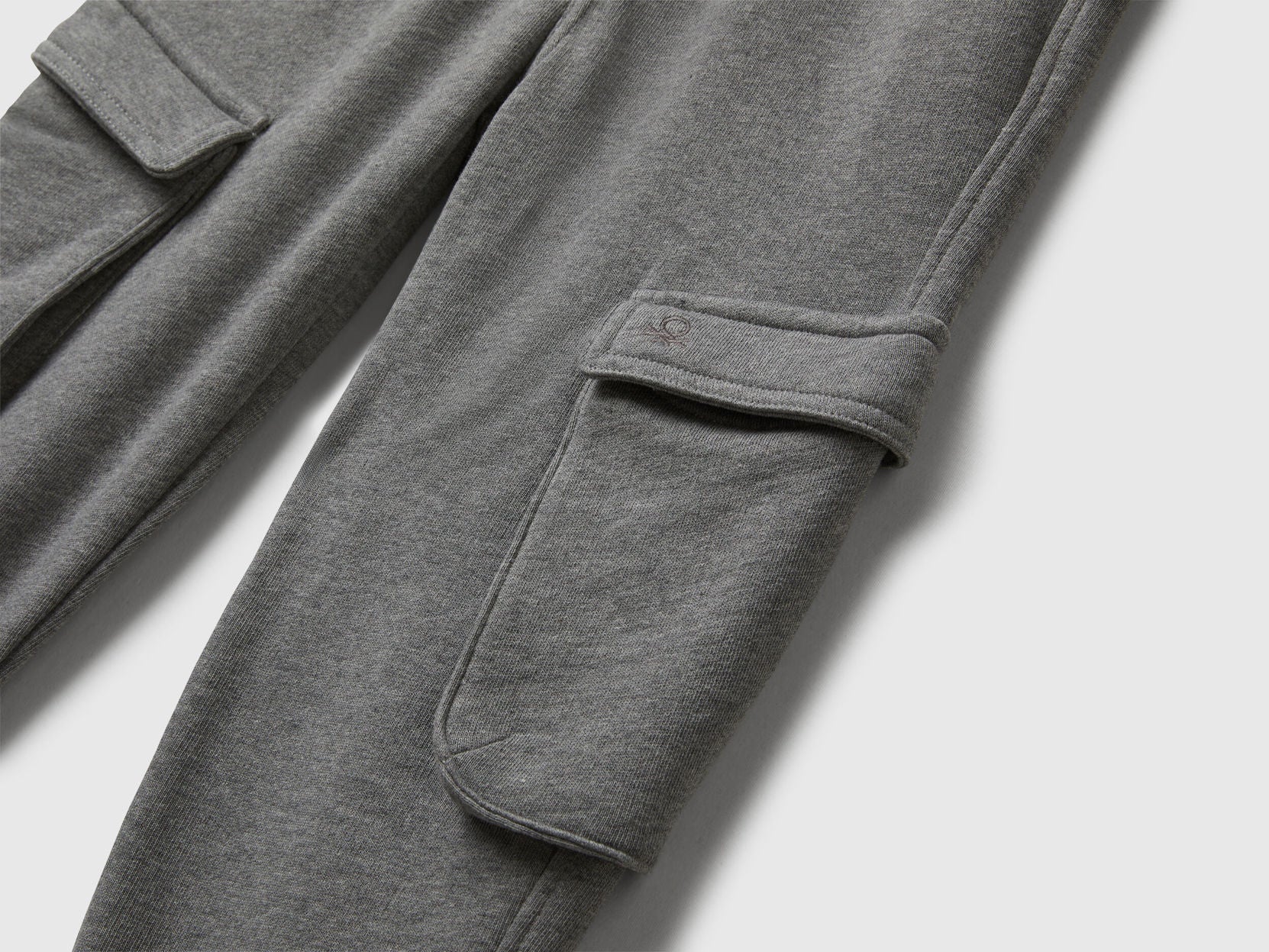 Close-up of Benetton sweatpants fabric texture and waist detail